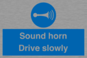 sound-horn-drive-slowly-warehousing-and-delivery-sign~